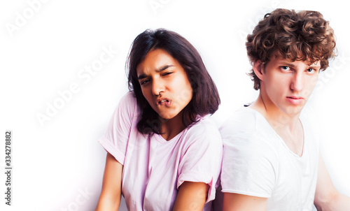 best friends teenage girl and boy together having fun, posing emotional on white background, couple happy smiling, lifestyle people concept, blond and brunette multi nations