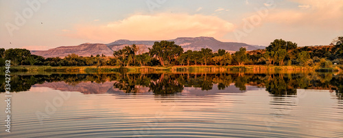 Grand Mesa from a Lake at Sunset - Palisade, Colorado photo