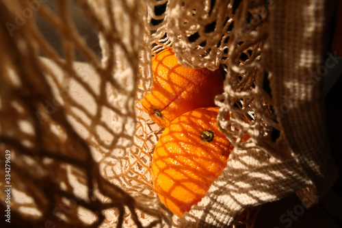no plastic eco string bag with oranges fruits healthy food diet vitamins