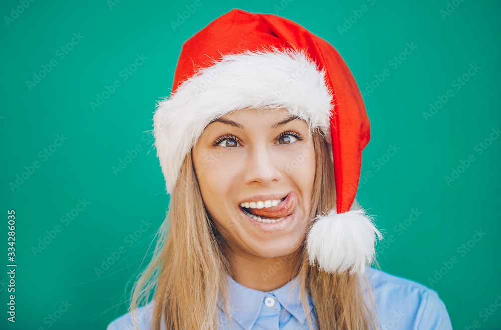 Funny woman Santa hat. Christmas woman. Funny photo. Funny woman Santa hat. Christmas woman. Funny photo.