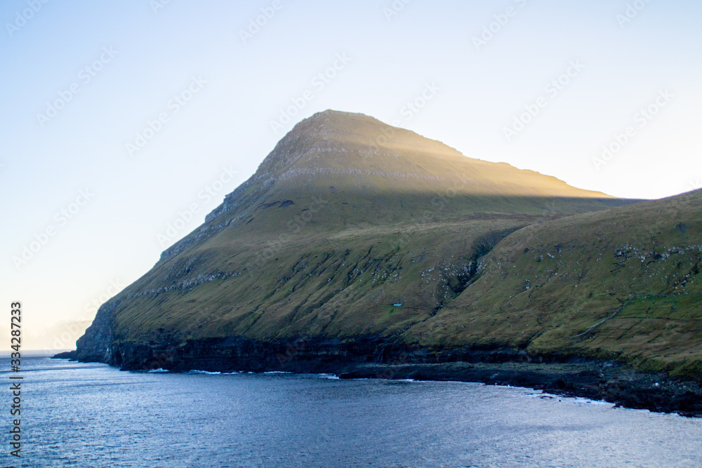 Golden hour panoramic landscape scenery in Stroymoy, Faroe Islands