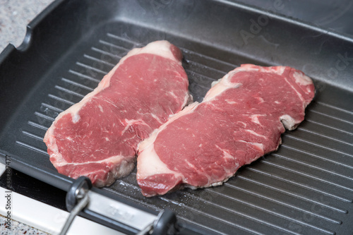 pan-fried beef steak. brown crust on the meat.