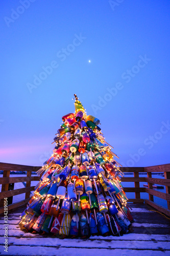 christmas tree near the ocean sunrise
