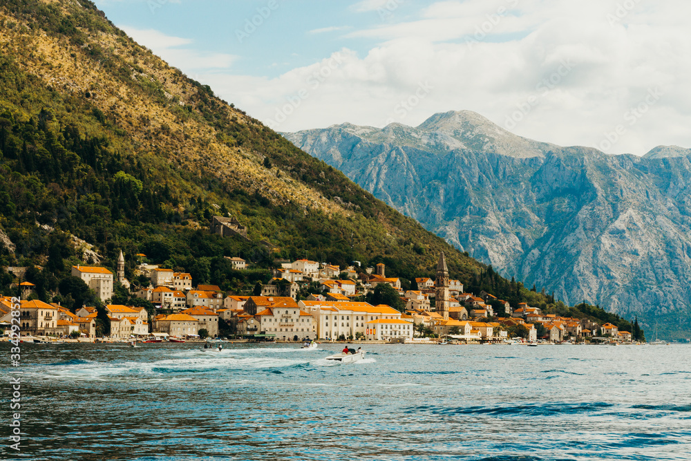 Beautiful view on promenade of ancient mediterranean city of Perast, Bay of Kotor, Montenegro