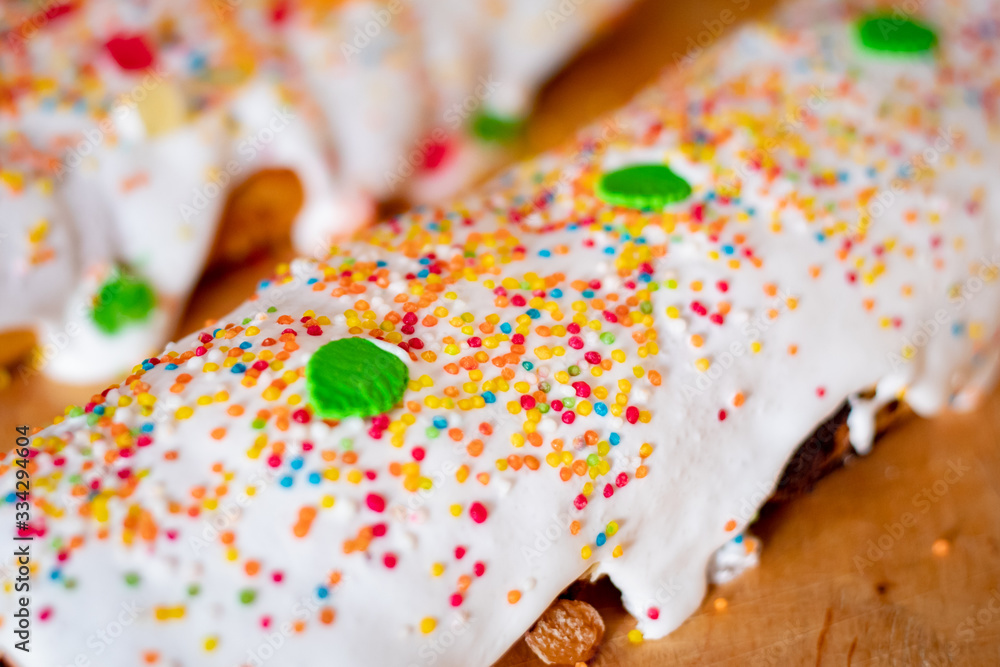 Fototapeta premium Beautiful easter holiday dessert Easter cake with white frosting and decoration, decoration for a holiday table