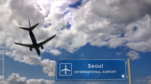 Photography Plane landing in Seoul with signboard