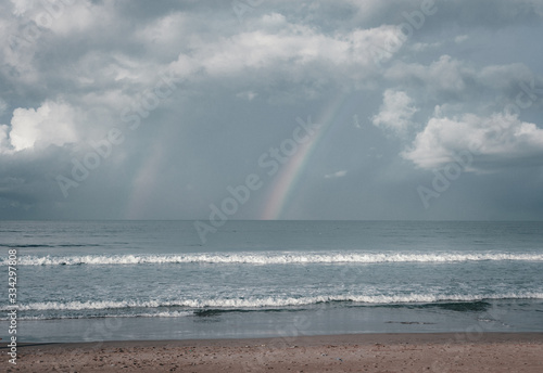 Beach and beautiful views of the cliffs, splashing waves and nature.