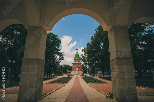 Presentation of the Child Jesus church in Tiraspol, capital of Transnistria, a self proclaimed territory in Moldova on a summer day. View between the pillars photo