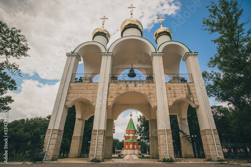 Presentation of the Child Jesus church in Tiraspol, capital of Transnistria, a self proclaimed territory in Moldova on a summer day. Frog view between the pillars photo