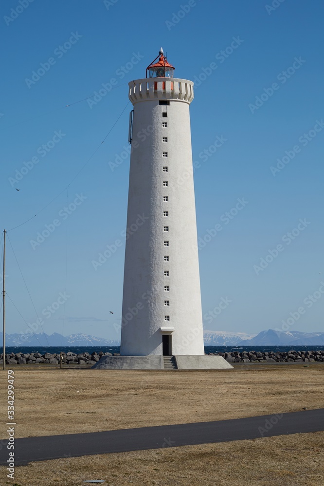 Small lighthouse on the tip of a peninsula