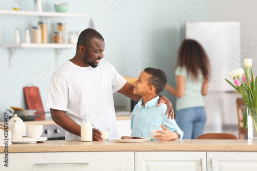 African-American man and hi...
