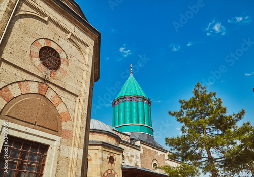 Mevlana tomb and Selimiye mosque at Konya, Turkey known also as mevlana kulliyesi or mevlana turbesi and Selimiye camii photo