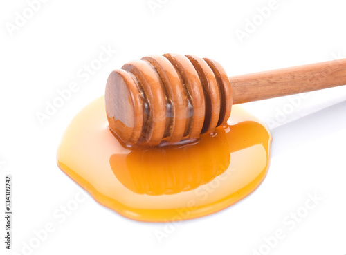 Wooden honey dipper with honey