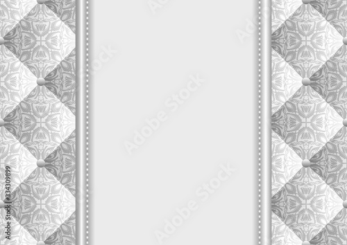 quilted fabric with vintage ornament and copy space