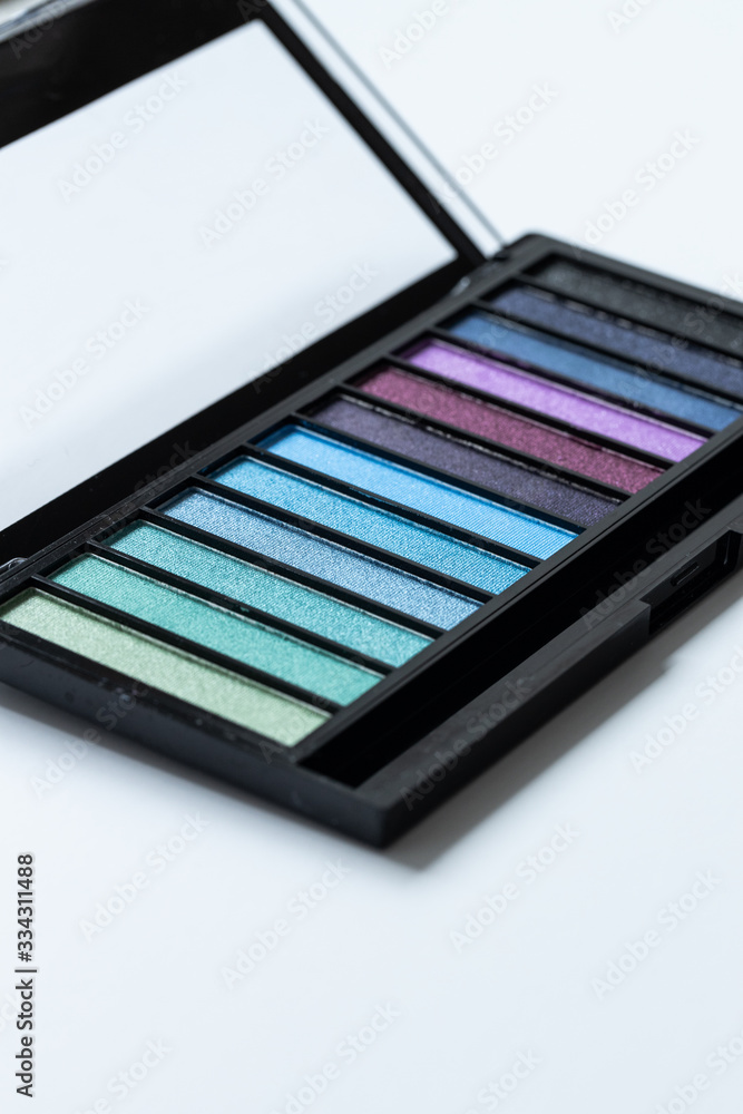 Colorful eyeshadow palette on white background Colorful eyeshadow palette on white background