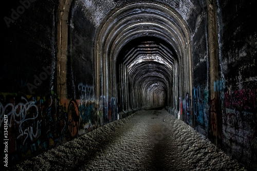 Train tunnel in northern California with graffiti