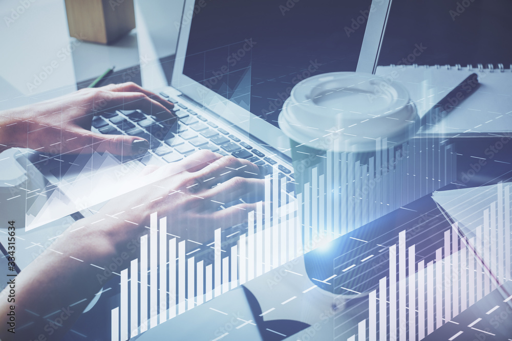 Double exposure of woman hands typing on computer and forex chart hologram drawing. Stock market invest concept. Double exposure of woman hands typing on computer and forex chart hologram drawing. Stock market invest concept.