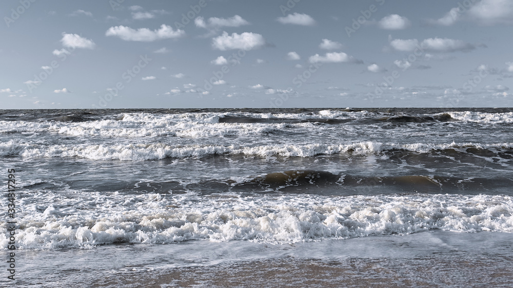 Sea waves on a summer day. Panoramic seascape. 