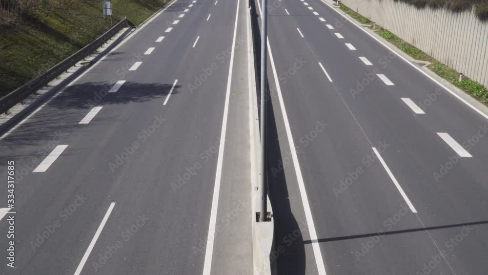Ljubljana / Slovenia - March 2020: Coronavirus COVID 19 quarantine, empty capital city of Ljubljana (Slovenia, Europe). Empty highway. Ljubljana / Slovenia - March 2020: Coronavirus COVID 19 quarantine, empty capital city of Ljubljana (Slovenia, Europe). Empty highway.