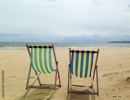 Two Relaxing Chairs on Bournemouth Beach UK