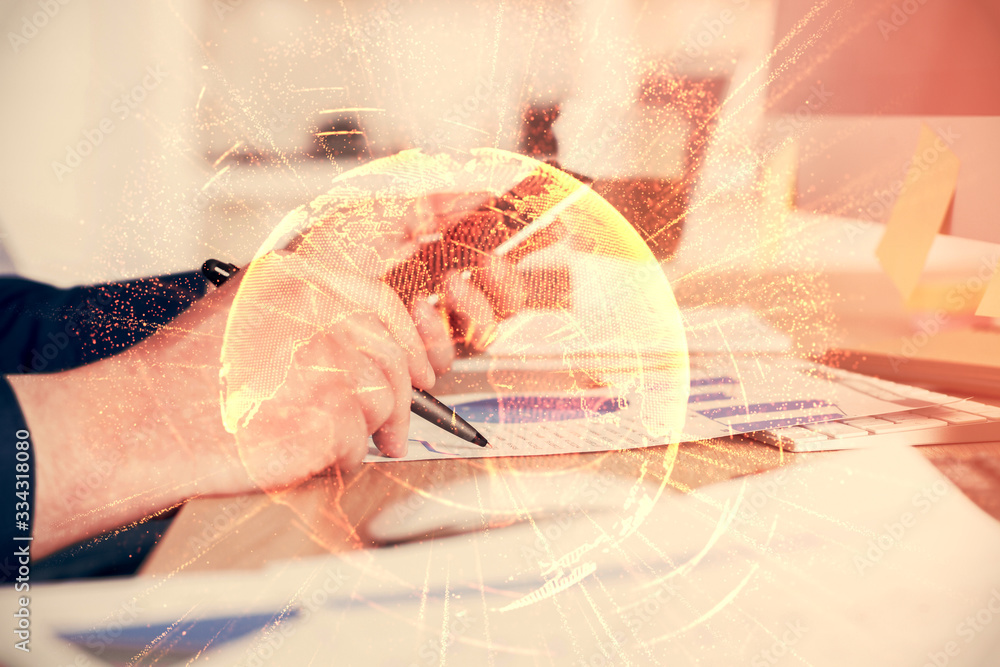 Double exposure of man's hands holding and using a phone and social network theme drawing. Double exposure of man's hands holding and using a phone and social network theme drawing.