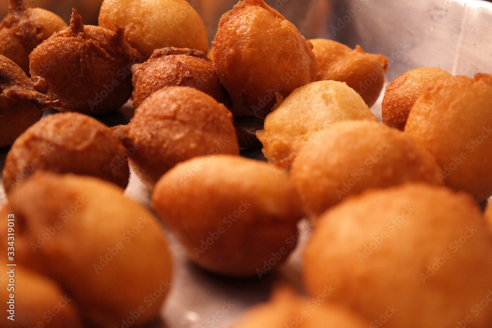 rain cookie - bolinho de chuva fried dough in the shape of balls, tipica do Brasil recipe with cinnamon and sugar rain cookie - bolinho de chuva fried dough in the shape of balls, tipica do Brasil recipe with cinnamon and sugar