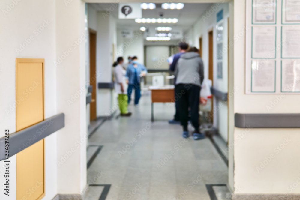 blurred background - hospital hall interior during restricted visits