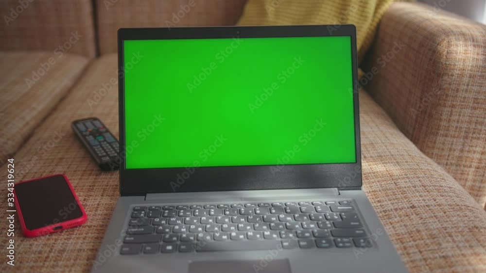 Shot of green screen on laptop at home workplace computer work communication technology business notebook monitor modern space display workspace keyboard Shot of green screen on laptop at home workplace computer work communication technology business notebook monitor modern space display workspace keyboard