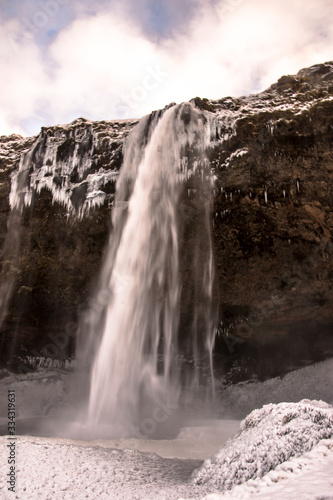 Beautiful Seljalandsfoss on a freezing winter day  Iceland  Europe. Go explore Viking s land in wintertime.