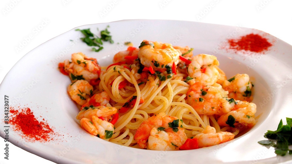 Studio photo of a mediterranean salad with spaghetti , shrimps and spices Studio photo of a mediterranean salad with spaghetti , shrimps and spices