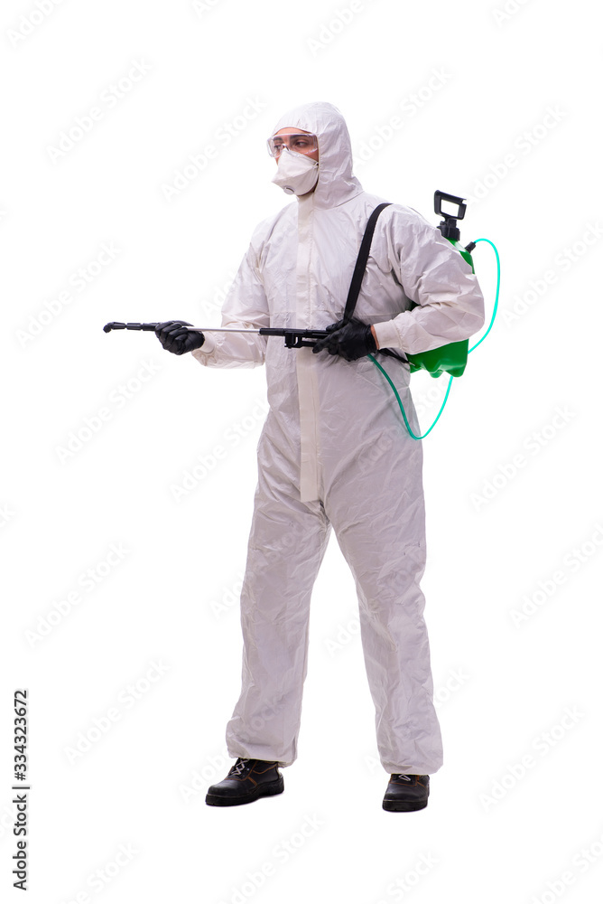Young male contractor disinfecting in coronavirus concept Young male contractor disinfecting in coronavirus concept