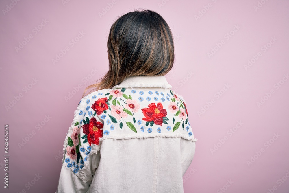 Young beautiful woman wearing fashion urban clothes, model wearing casual street style standing over pink background Young beautiful woman wearing fashion urban clothes, model wearing casual street style standing over pink background