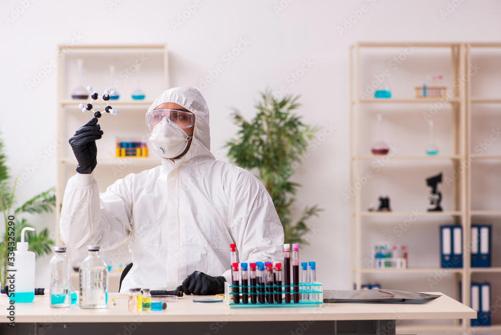 Doctor working in lab in coronavirus COVID-19 concept Doctor working in lab in coronavirus COVID-19 concept