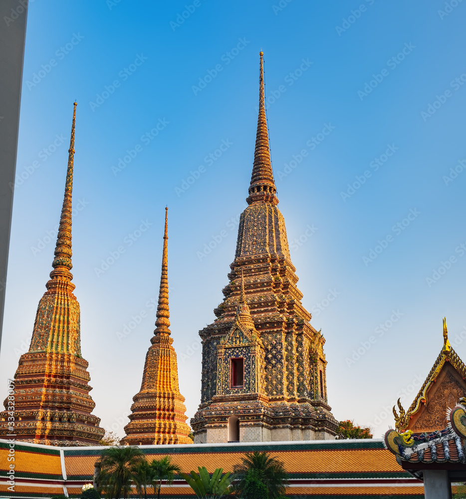 Fototapeta premium Classical Thai architecture of Wat Pho public ancient temple in Bangkok, Thailand.