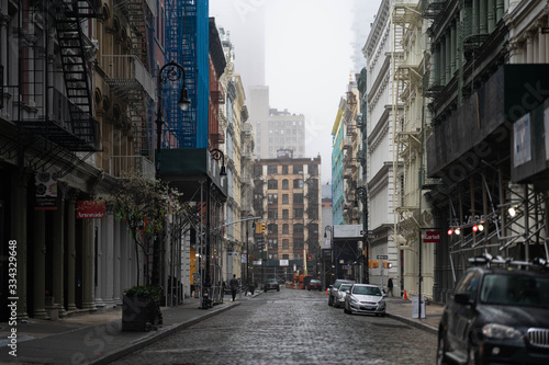 Fototapeta Naklejka Na Ścianę i Meble -  New York City buildings details. Manhattan buildings rentals. Empty streets of Manhattan in New York. 