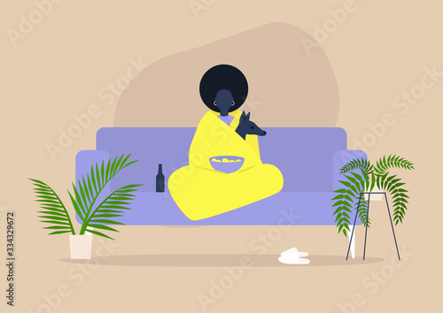 Stay home concept, social self isolation, young black female character cuddling with their dog wrapped in a blanket