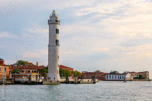 Historic active Murano Lighthouse located on the famous island of Murano in the Venetian Lagoon, Venice, Italy