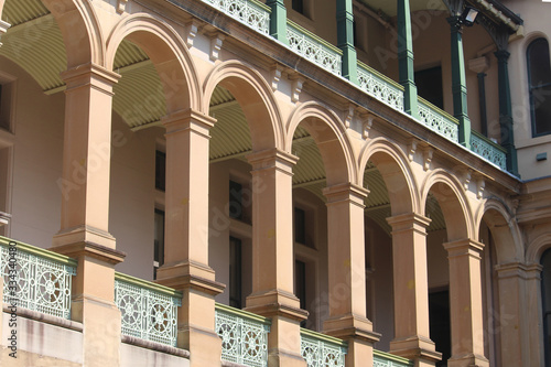 Sticker A balcony with a series of arches and cast iron balustrade