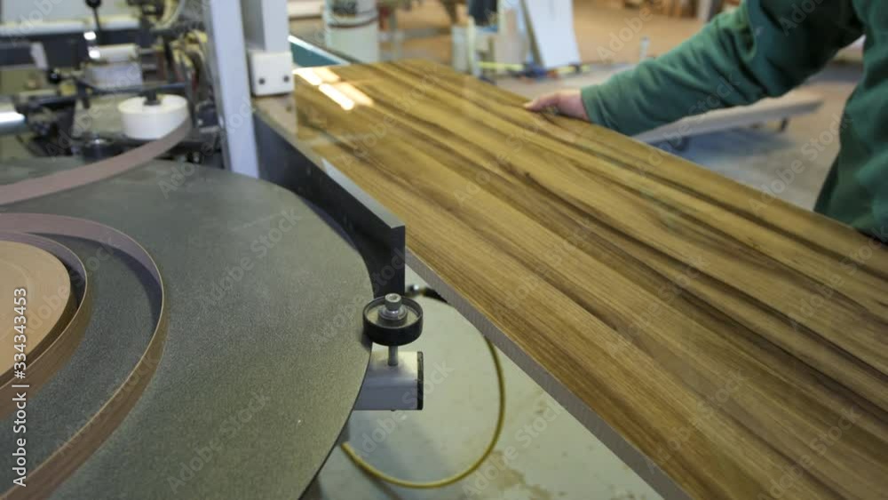 Carpenter cutting wood