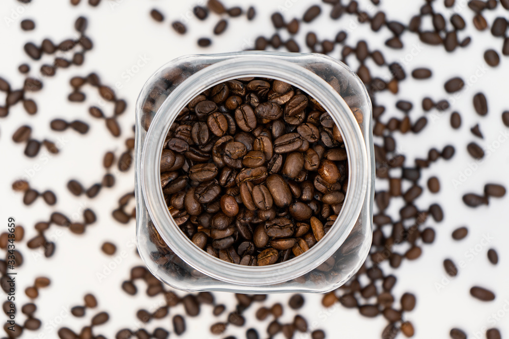 coffee beans on glass container in top view