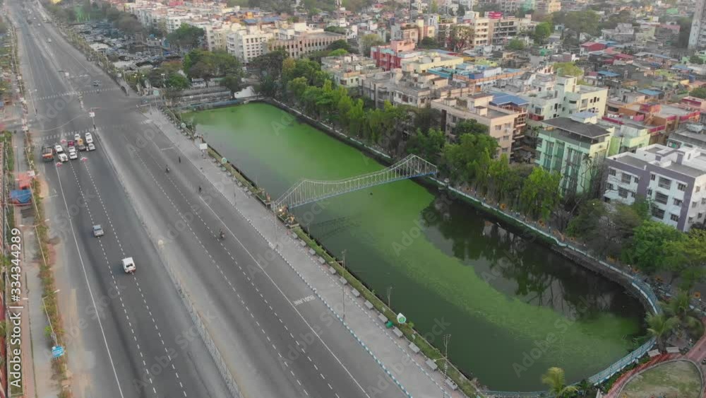 Howrah bridge in Kolkata patuli garia biswabangla drone footage aerial view floating market. Indian roads and landmarks of subcontinent. Howrah bridge in Kolkata patuli garia biswabangla drone footage aerial view floating market. Indian roads and landmarks of subcontinent.