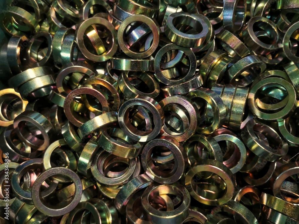 Bushings. Metal engineering. Lathe and drilling technology with zinc plated coating Stock Photo