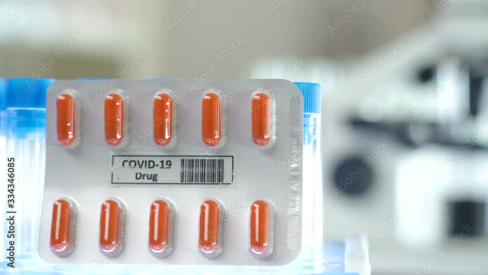 The orange capsules of the Covid-19 drug or coronavirus drug The orange capsules of the Covid-19 drug or coronavirus drug