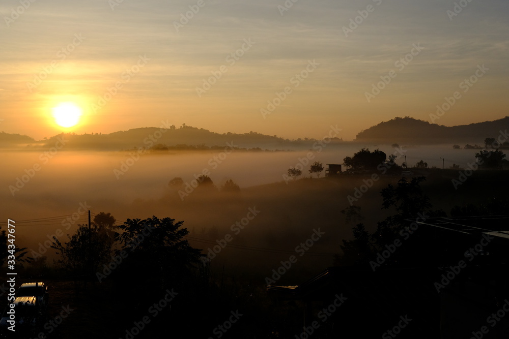 Morning sunrise with fog. Natural landscape