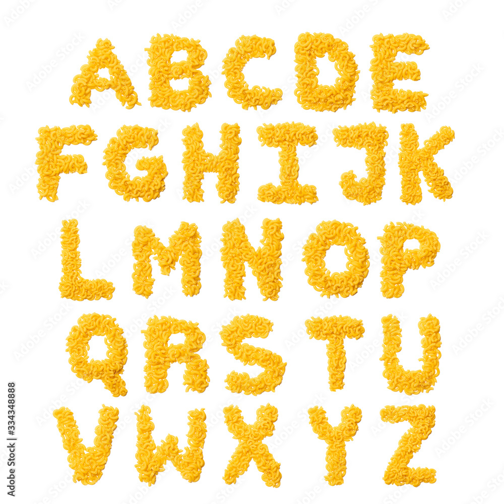 English alphabet from dry pasta on a white isolated background. Food pattern made from macaroni. Bright alphabet for shops.