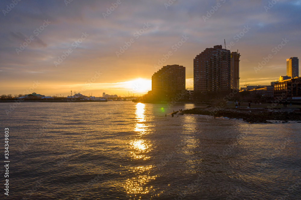 Aerial photograph of Jersey waterfront with the Hudson Rivers at Sunset Aerial photograph of Jersey waterfront with the Hudson Rivers at Sunset