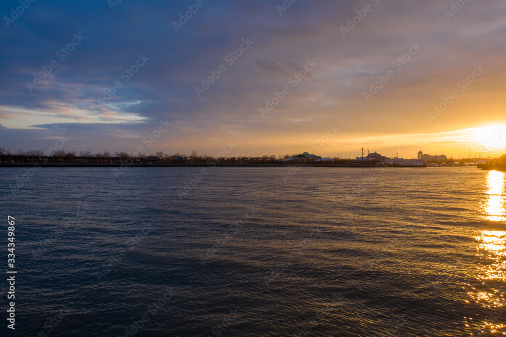 Aerial photograph of Jersey waterfront with the Hudson Rivers at Sunset