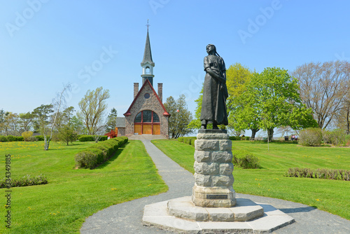 Memorial Church in Grand Pre National Historic Site, Wolfville, Nova Scotia, Canada. Grand-Pré area is a center of Acadian settlement from 1682 to 1755. Now this site is a UNESCO World Heritage Site. photo