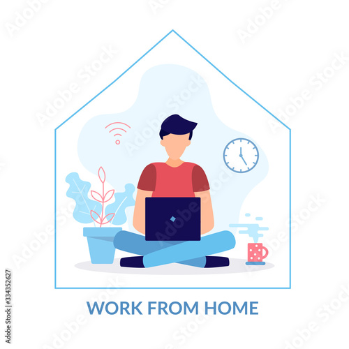 A man with a computer works from home. Programming, remote work, freelancing. Quarantine to coronovirus. Work from home. 