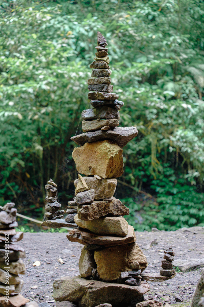 Pile of rock stacked in balance with each other to form a tower, an ancient ritual of good fortune and prosperity. Pile of rock stacked in balance with each other to form a tower, an ancient ritual of good fortune and prosperity.